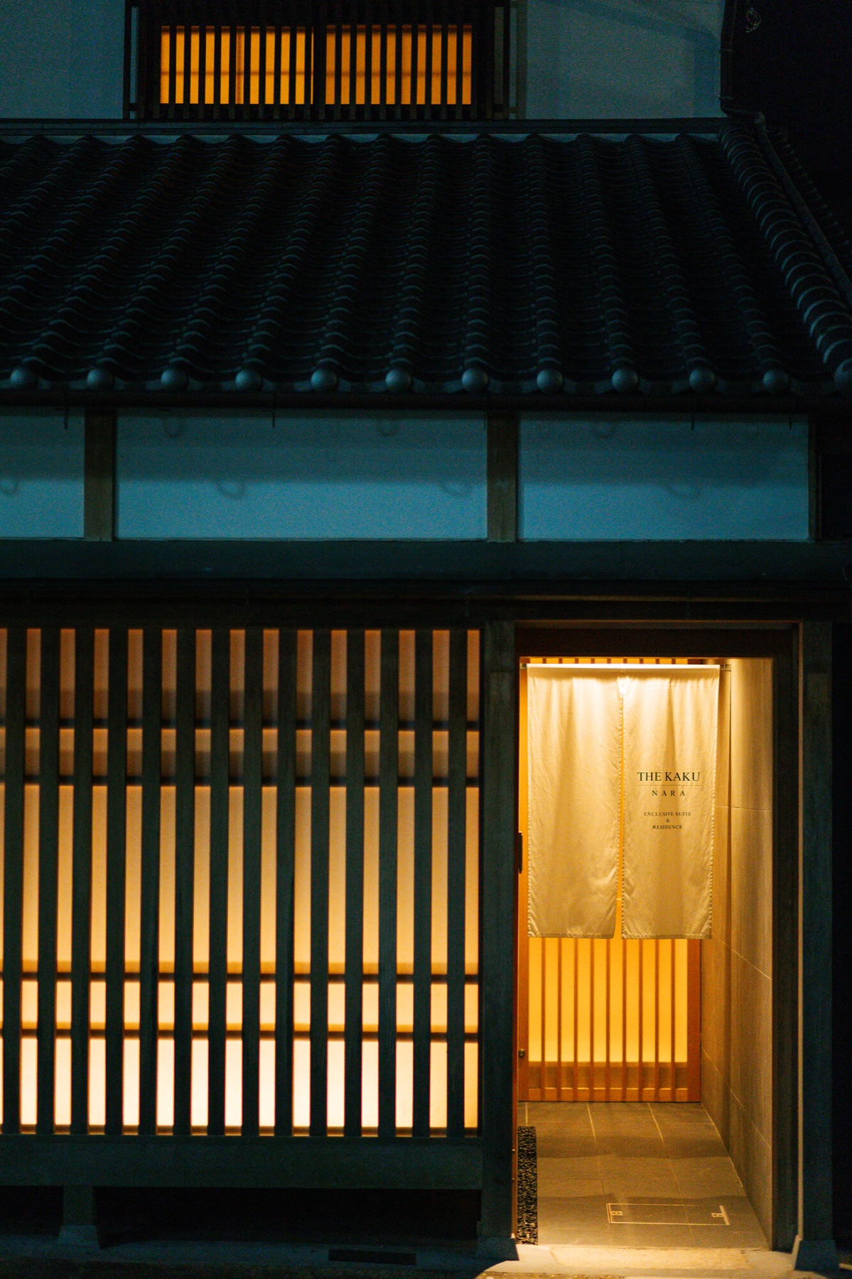 Light filtering through traditional latticework at THE KAKU in Nara