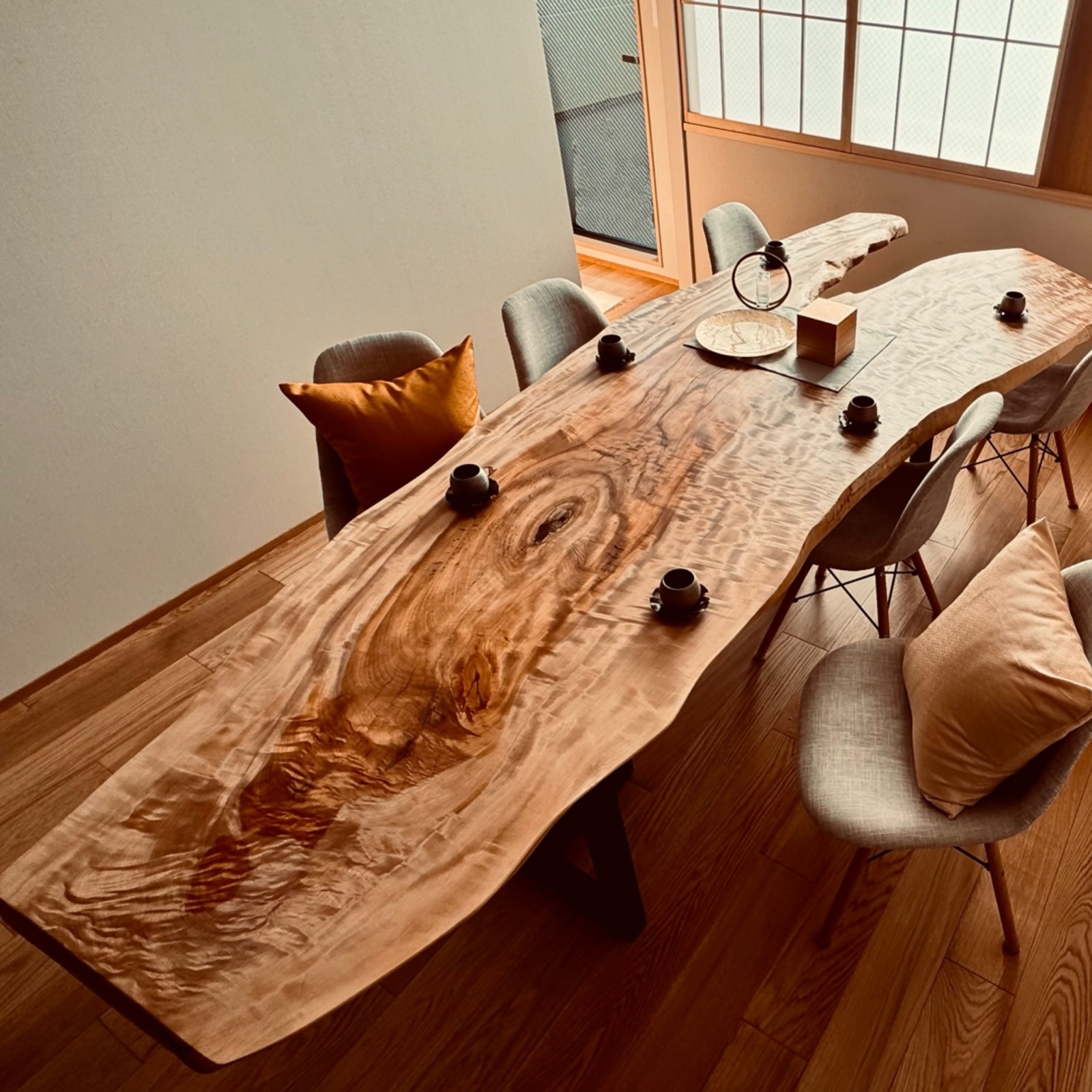 A handcrafted timber table inside THE KAKU